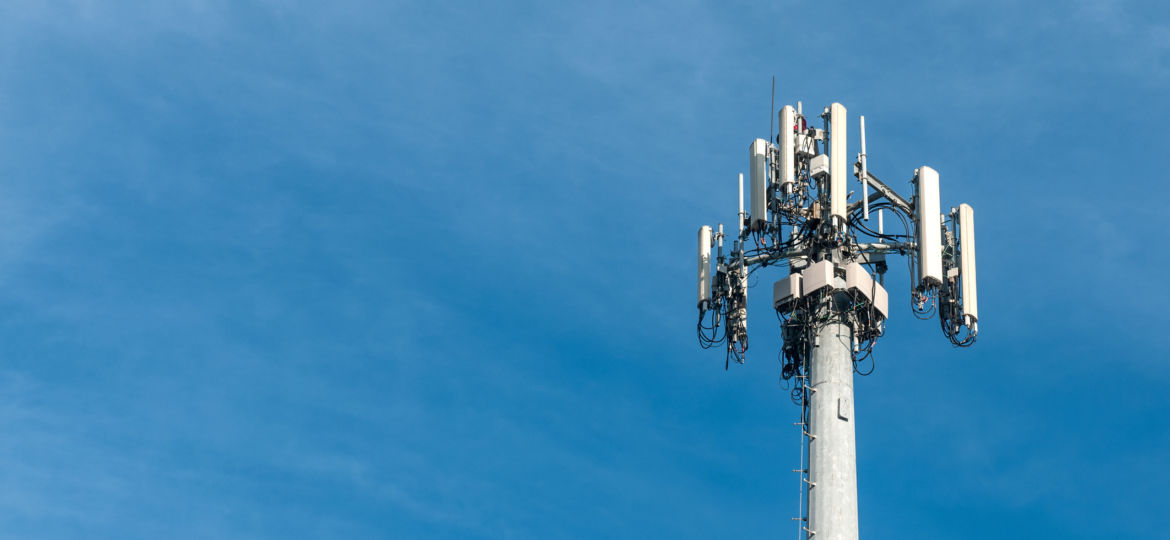 cell tower against a clear blue sky